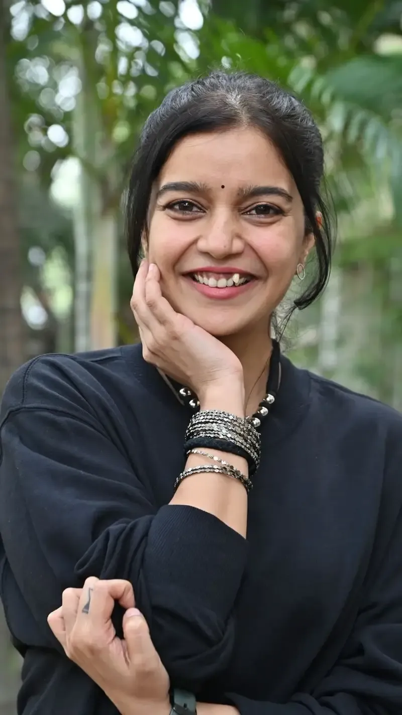 Actress Colors Swathi in Black Dress at Month Of Madhu Movie Press Meet